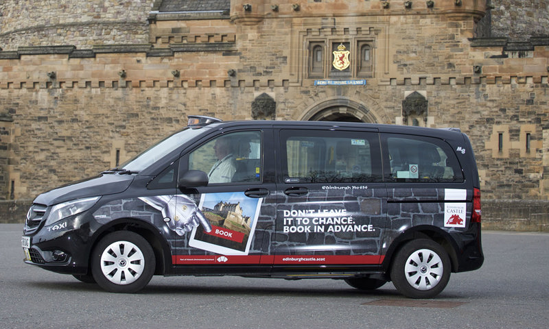 Branded Edinburgh Castle taxi on the castle esplanade