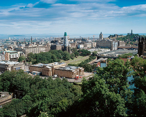 View from Edinburgh Castle of Princes Street with the National Gallery of Scotland in the foreground and the Firth of Forth in the distance